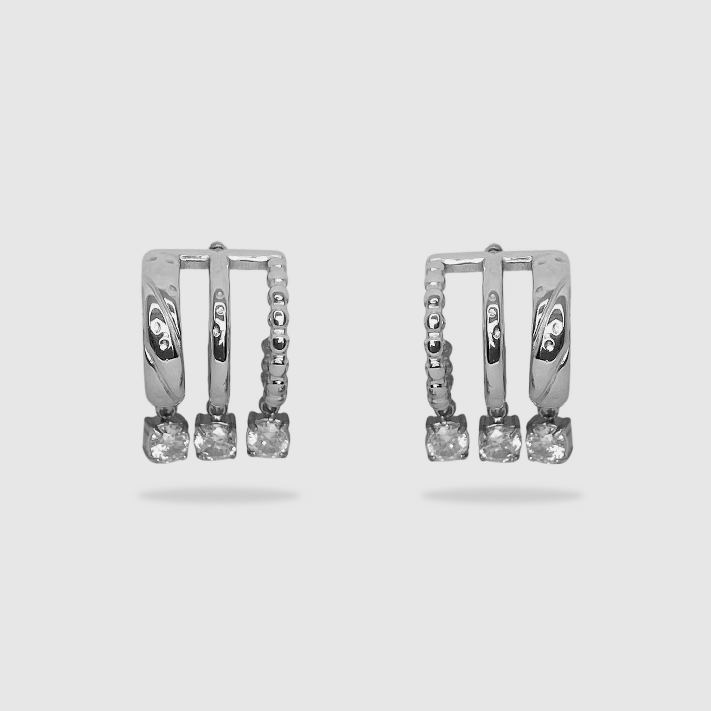 Boucles d'oreilles Lima, acier inoxydable, 3 diamants (imitation), triple anneaux, couleur argent