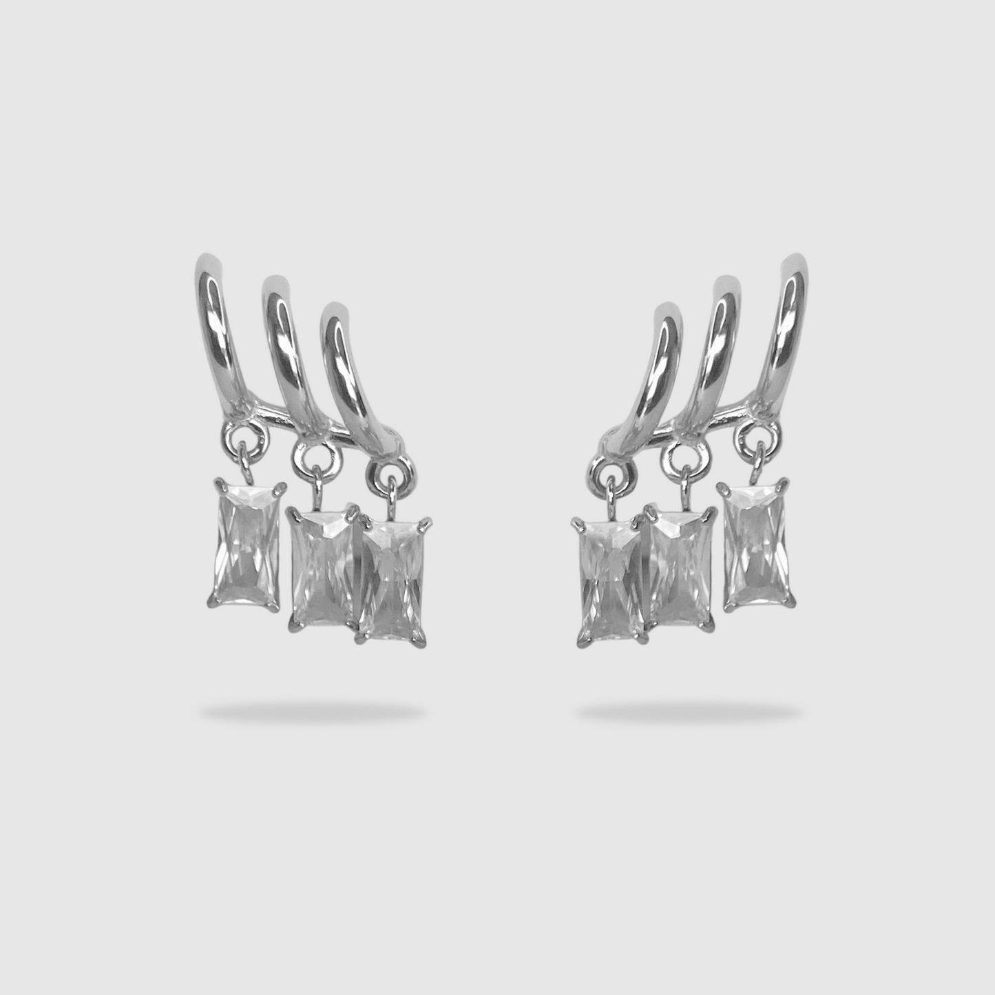 Boucles d'oreilles Lola, Acier inoxydable, 3 diamants (imitation), 3 demi-anneaux, couleur argent