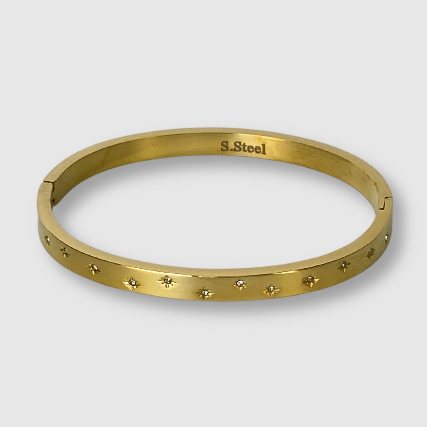 Bracelet-jonc Stella, acier inoxydable, strass, étoiles, couleur or