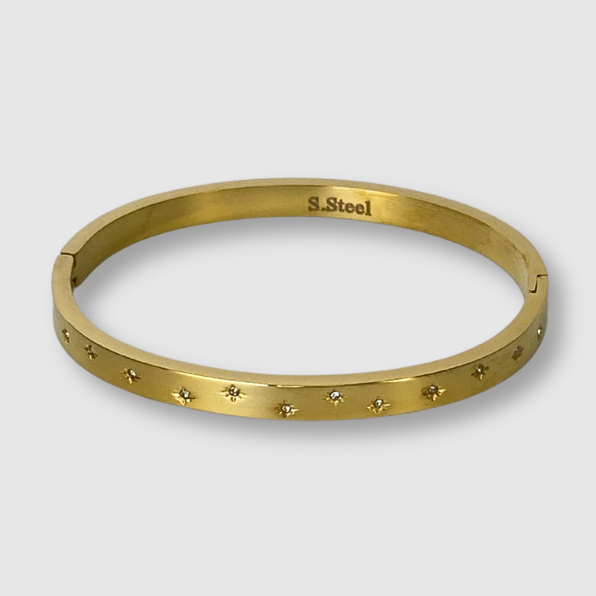Bracelet-jonc Stella, acier inoxydable, strass, étoiles, couleur or