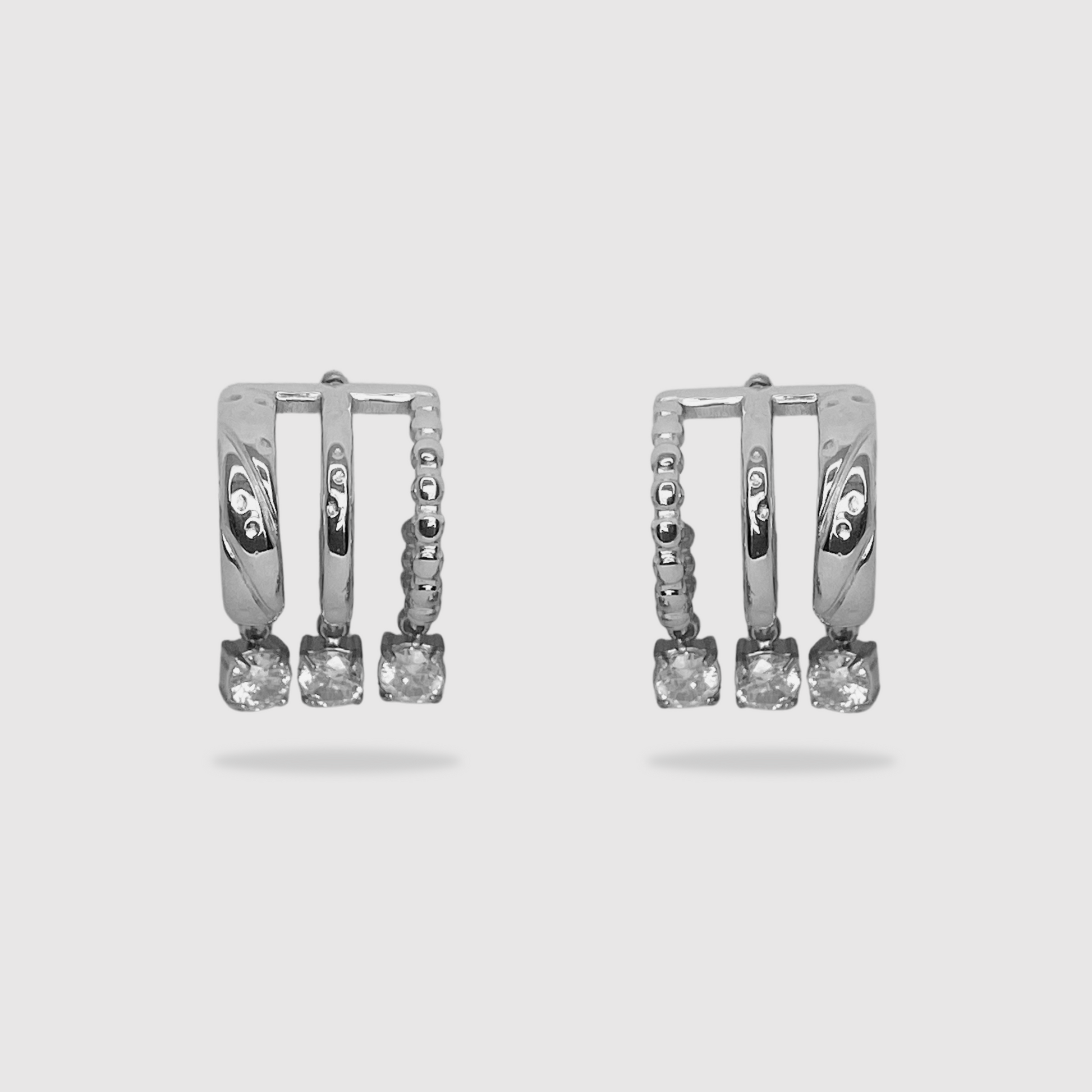 Boucles d'oreilles Lima, acier inoxydable, 3 diamants (imitation), triple anneaux, couleur argent